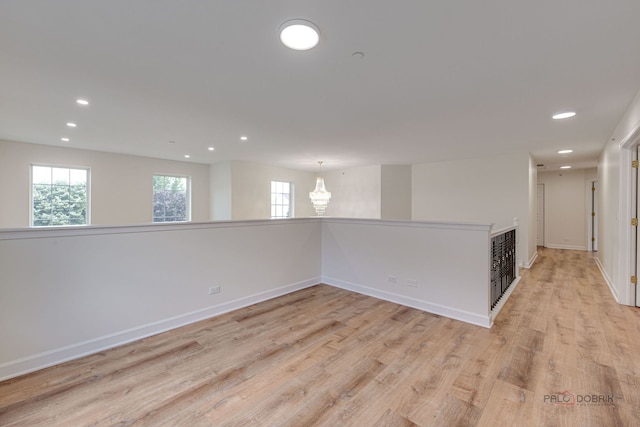 5860 Betty Gloyd Dr, Hoffman Estates, IL 60192 - spare room with a chandelier, recessed lighting, and light wood finished floors