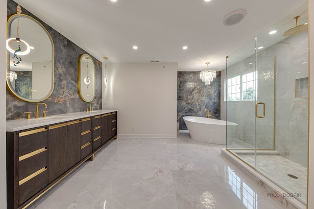 5860 Betty Gloyd Dr, Hoffman Estates, IL 60192 - bathroom featuring marble tiled flooring, a shower stall, a freestanding bath, recessed lighting, and double vanity