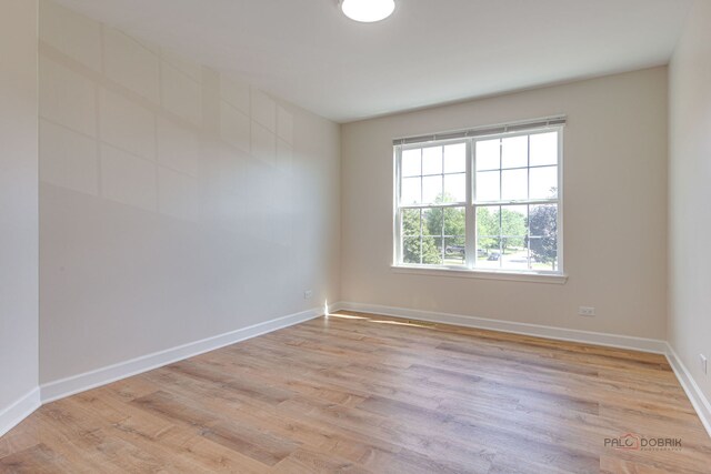 5860 Betty Gloyd Dr, Hoffman Estates, IL 60192 - spare room with light wood-style floors