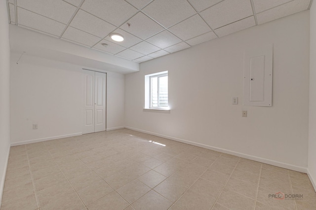 5860 Betty Gloyd Dr, Hoffman Estates, IL 60192 - unfurnished room featuring electric panel, a drop ceiling, light tile patterned floors, and fire sprinkler in ceiling