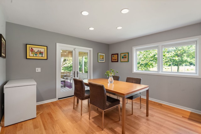 1670 Jasmine Ct, Highland Park, IL 60035 - dining area featuring plenty of natural light, french doors, light wood-style floors, and recessed lighting