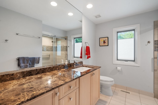 1670 Jasmine Ct, Highland Park, IL 60035 - full bathroom with vanity, healthy amount of natural light, a shower stall, tile patterned flooring, and recessed lighting