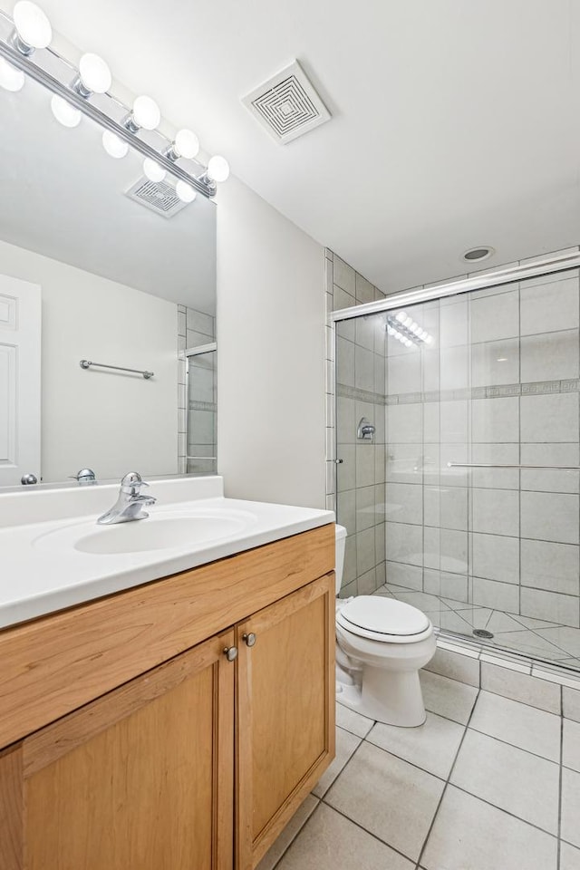 1917 S State St Unit 1, Chicago, IL 60616 - bathroom featuring vanity, a shower stall, and tile patterned flooring