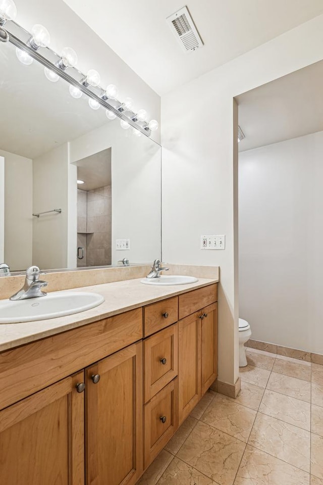 1917 S State St Unit 1, Chicago, IL 60616 - full bath featuring double vanity and toilet