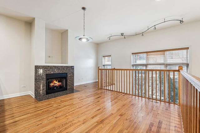 1917 S State St Unit 1, Chicago, IL 60616 - unfurnished living room with wood finished floors and a fireplace with flush hearth