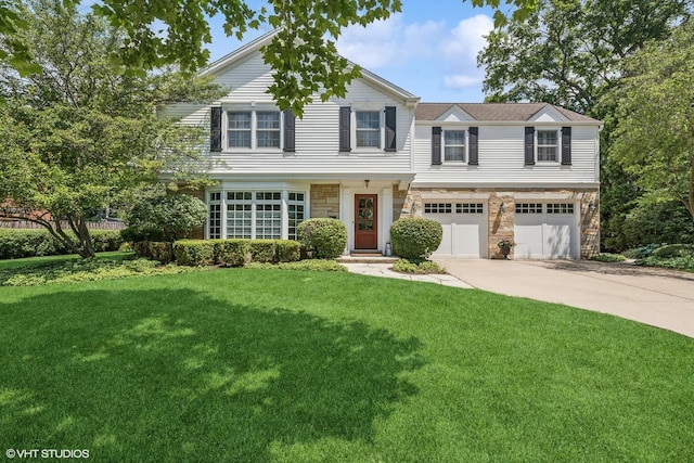 423 S Beverly Ln, Arlington Heights, IL 60005 - view of front of property with stone siding, concrete driveway, an attached garage, and a front yard