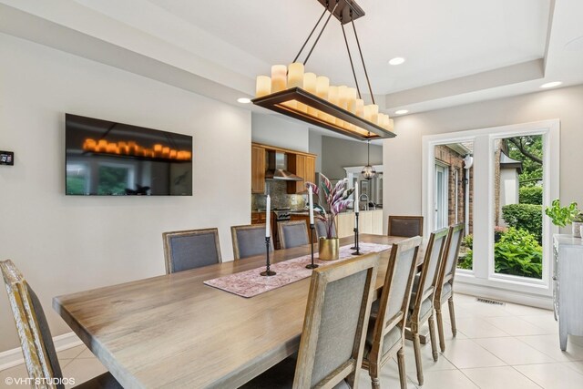 423 S Beverly Ln, Arlington Heights, IL 60005 - dining area with light tile patterned flooring, recessed lighting, and a chandelier