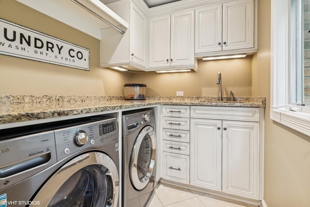 423 S Beverly Ln, Arlington Heights, IL 60005 - washroom with independent washer and dryer, cabinet space, and light tile patterned flooring
