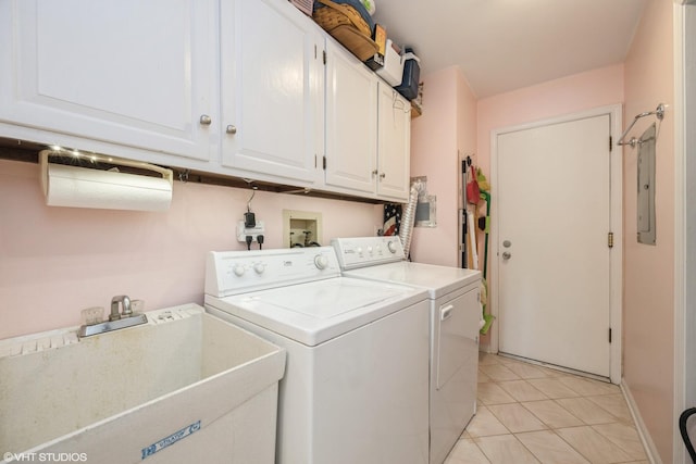 601 Lake Hinsdale Dr Unit 104, Willowbrook, IL 60527 - washroom featuring cabinet space, washing machine and dryer, light tile patterned floors, and electric panel
