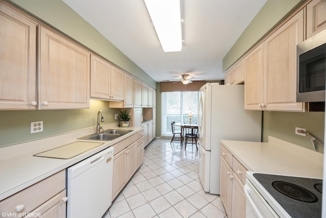 601 Lake Hinsdale Dr Unit 104, Willowbrook, IL 60527 - kitchen with white appliances, light brown cabinetry, and light countertops