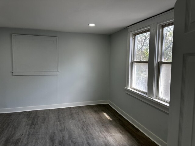 7621 S Eberhart Ave, Chicago, IL 60619 - spare room featuring dark wood-style floors and recessed lighting