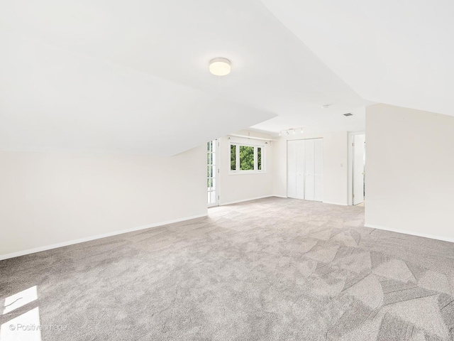 118 Burlington Ave, Clarendon Hills, IL 60514 - additional living space featuring lofted ceiling and carpet