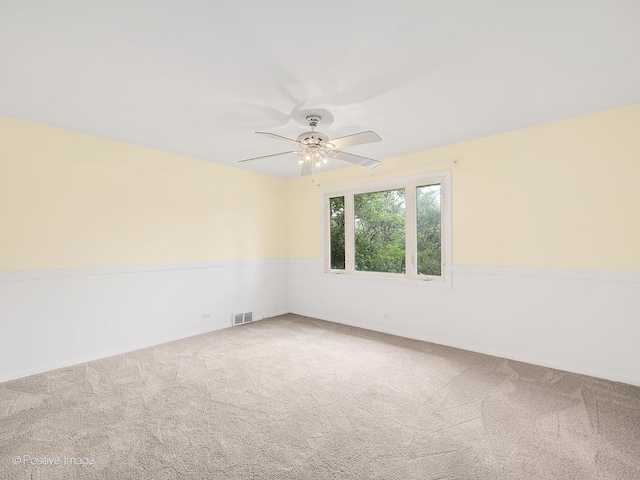 118 Burlington Ave, Clarendon Hills, IL 60514 - carpeted empty room with ceiling fan
