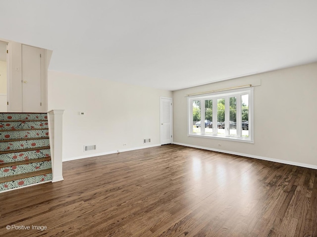 118 Burlington Ave, Clarendon Hills, IL 60514 - unfurnished living room with wood finished floors and stairs
