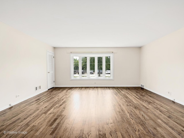 118 Burlington Ave, Clarendon Hills, IL 60514 - empty room with wood finished floors and baseboards