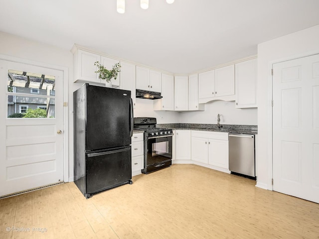 118 Burlington Ave, Clarendon Hills, IL 60514 - kitchen featuring black appliances, under cabinet range hood, white cabinetry, and light wood-style floors