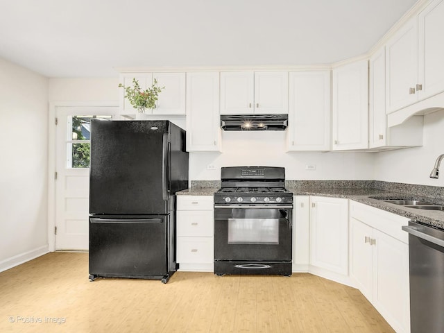 118 Burlington Ave, Clarendon Hills, IL 60514 - kitchen featuring black appliances, light wood-style flooring, under cabinet range hood, and white cabinets
