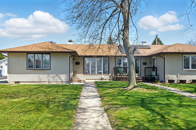 8801 S Kilbourn Ave, Hometown, IL 60456 - ranch-style house featuring roof mounted solar panels and a front lawn