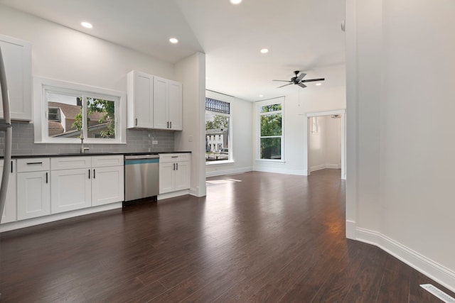 718 Sycamore St, Ottawa, IL 61350 - kitchen with dishwasher, dark countertops, tasteful backsplash, ceiling fan, and recessed lighting