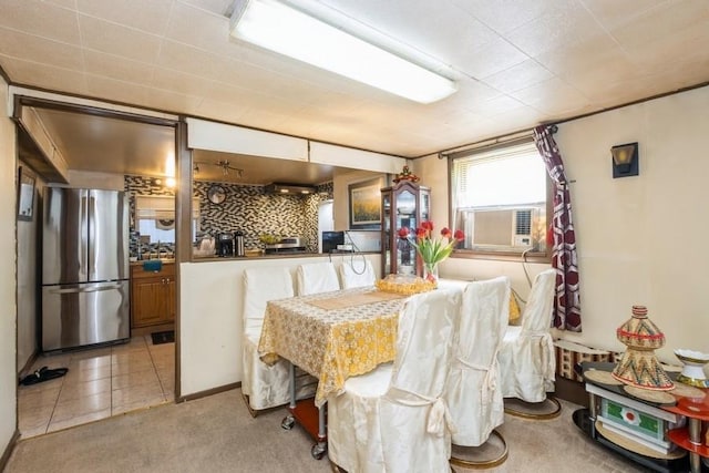 6612 N Mozart St, Chicago, IL 60645 - dining area with light colored carpet and cooling unit