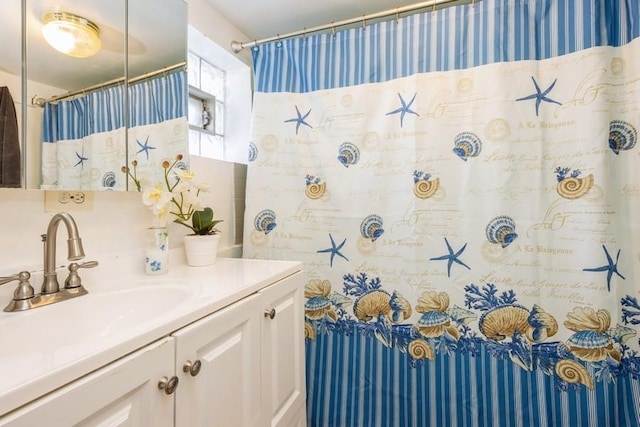 6612 N Mozart St, Chicago, IL 60645 - bathroom featuring vanity and a shower with shower curtain