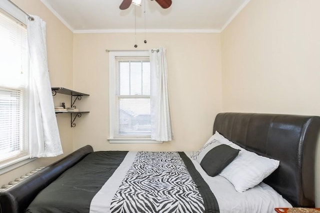 6612 N Mozart St, Chicago, IL 60645 - bedroom with crown molding and a ceiling fan