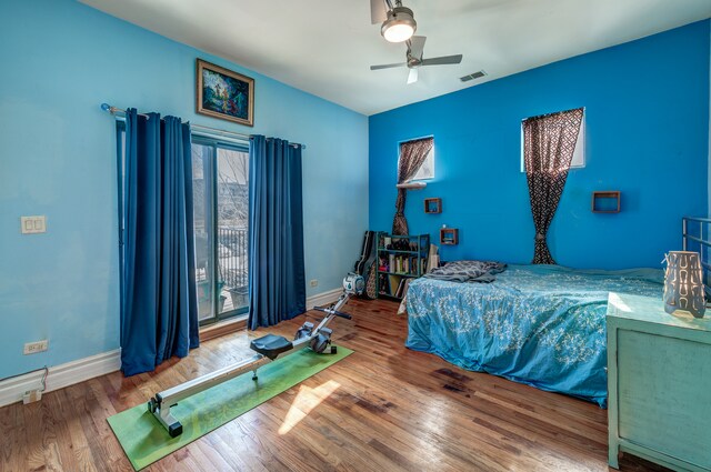 4543 S Prairie Ave Unit 3S, Chicago, IL 60653 - bedroom featuring wood finished floors, access to exterior, and ceiling fan