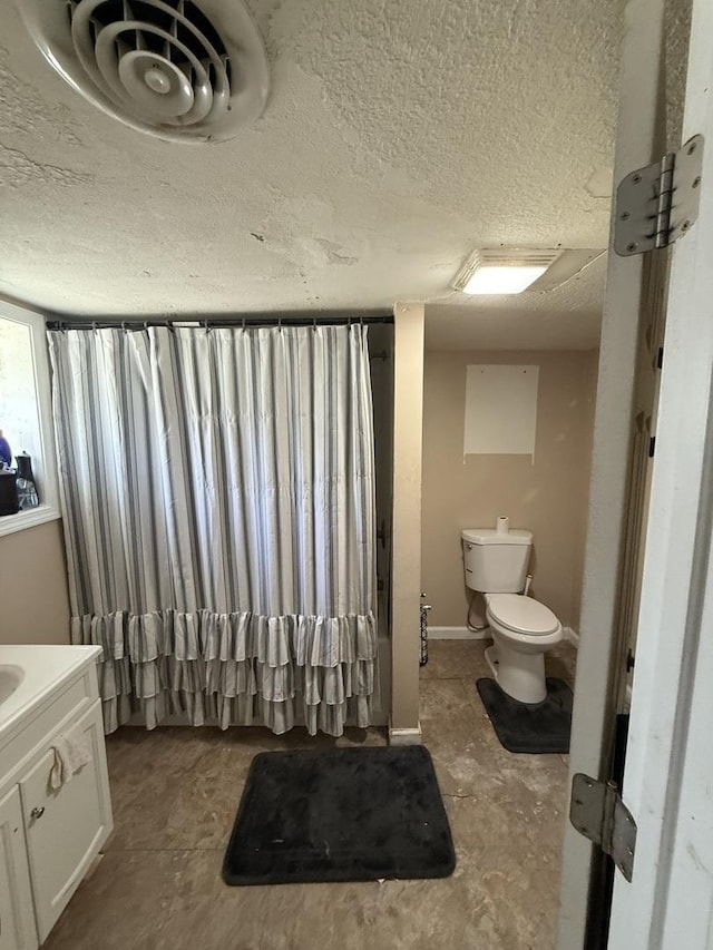 24041/2 W John St, Champaign, IL 61820 - full bathroom featuring vanity and a textured ceiling