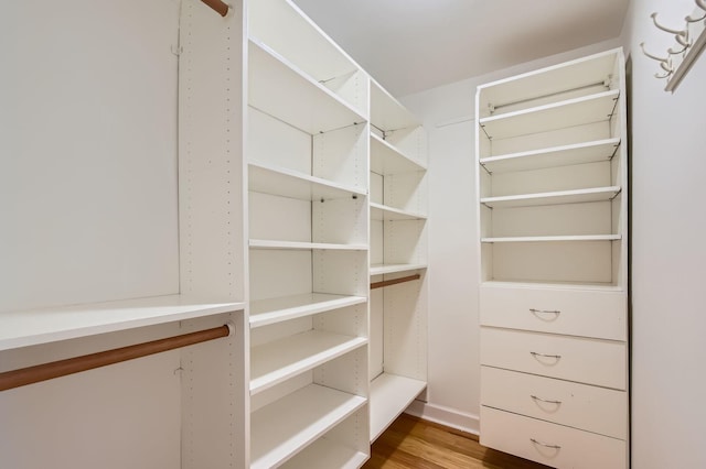 6007 N Sheridan Rd Unit 36F, Chicago, IL 60660 - walk in closet featuring wood finished floors
