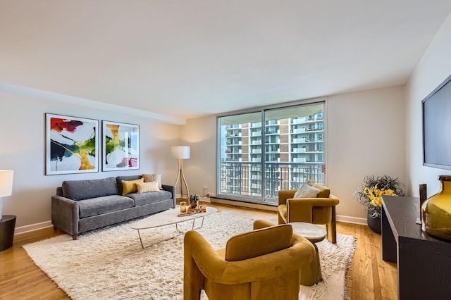 6007 N Sheridan Rd Unit 36F, Chicago, IL 60660 - living area with light wood-type flooring and a baseboard radiator