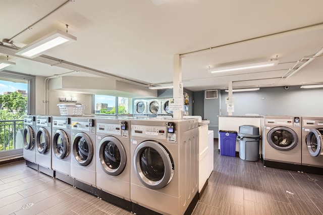 6007 N Sheridan Rd Unit 36F, Chicago, IL 60660 - communal laundry room with washer and dryer and wood finished floors