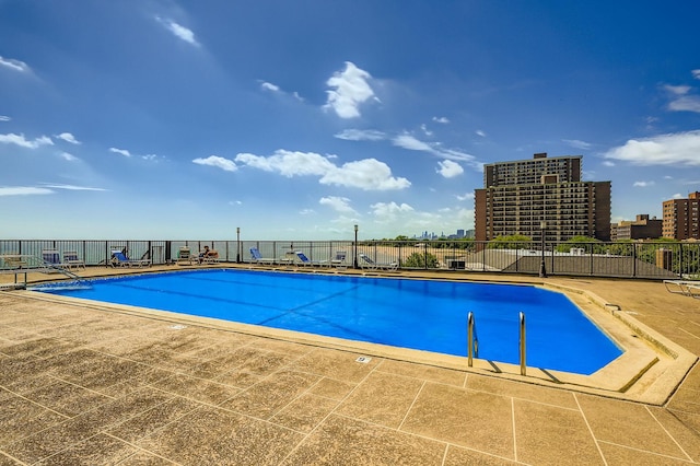 6007 N Sheridan Rd Unit 36F, Chicago, IL 60660 - community pool with a patio area and a view of city