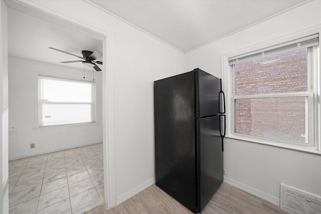12216 S Carpenter St, Chicago, IL 60643 - kitchen featuring freestanding refrigerator, ceiling fan, and light wood-style flooring