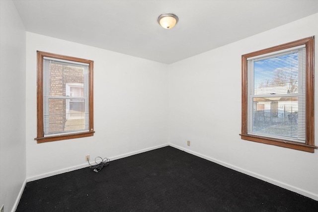 12216 S Carpenter St, Chicago, IL 60643 - empty room featuring baseboards and dark colored carpet