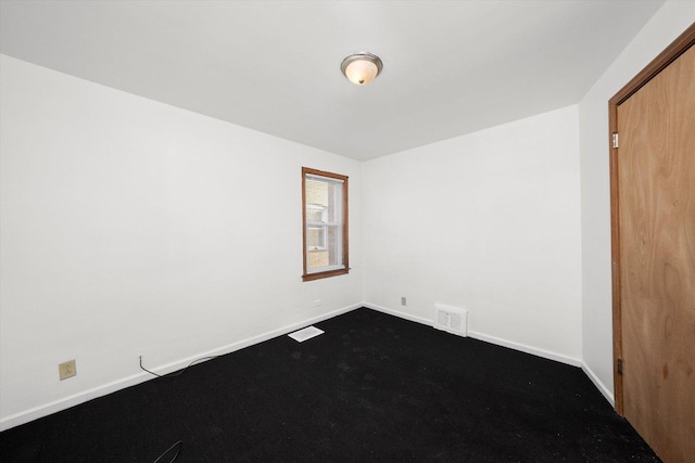 12216 S Carpenter St, Chicago, IL 60643 - empty room with baseboards and dark carpet