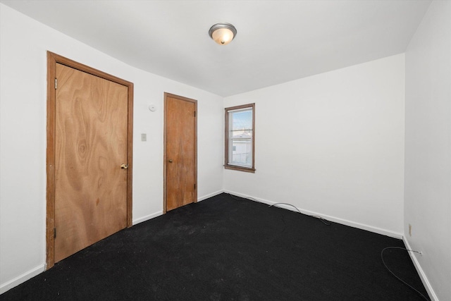 12216 S Carpenter St, Chicago, IL 60643 - spare room with baseboards and dark carpet