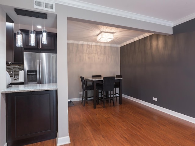 1 Oak Creek Dr Unit 2305, Buffalo Grove, IL 60089 - dining room featuring wood finished floors and crown molding