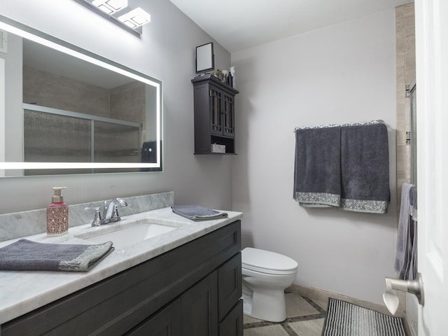 1 Oak Creek Dr Unit 2305, Buffalo Grove, IL 60089 - bathroom featuring vanity, a shower with door, and tile patterned floors