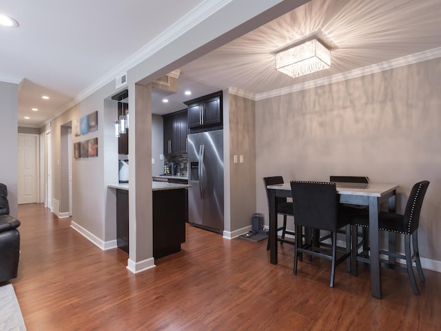 1 Oak Creek Dr Unit 2305, Buffalo Grove, IL 60089 - dining space with dark wood-type flooring, crown molding, recessed lighting, and a chandelier