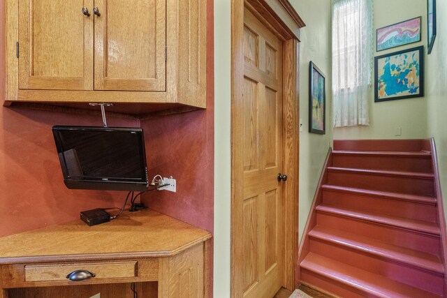 311 Nicholson St, Joliet, IL 60435 - kitchen with stainless steel appliances, dark countertops, a kitchen island, backsplash, and decorative light fixtures
