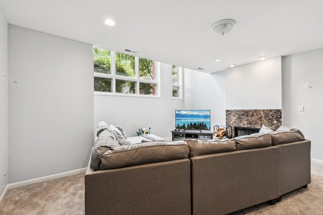 3041 N California Ave Unit 1, Chicago, IL 60618 - living room featuring light colored carpet, a premium fireplace, and recessed lighting