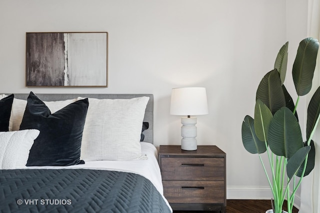 2259 W Wabansia Ave Unit 309, Chicago, IL 60647 - bedroom featuring baseboards and wood finished floors