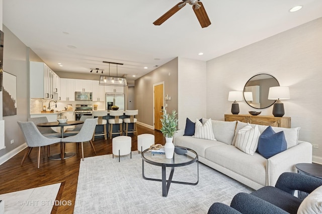2259 W Wabansia Ave Unit 309, Chicago, IL 60647 - living room featuring ceiling fan, wood finished floors, and recessed lighting