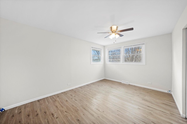3508 Maple Ln, Hazel Crest, IL 60429 - spare room featuring ceiling fan and light wood finished floors