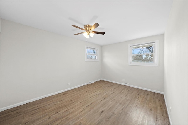 3508 Maple Ln, Hazel Crest, IL 60429 - empty room with wood finished floors and a ceiling fan