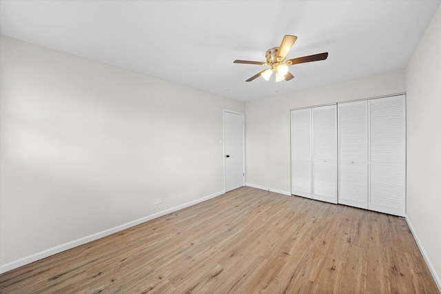 3508 Maple Ln, Hazel Crest, IL 60429 - unfurnished bedroom featuring light wood-type flooring, a closet, and ceiling fan