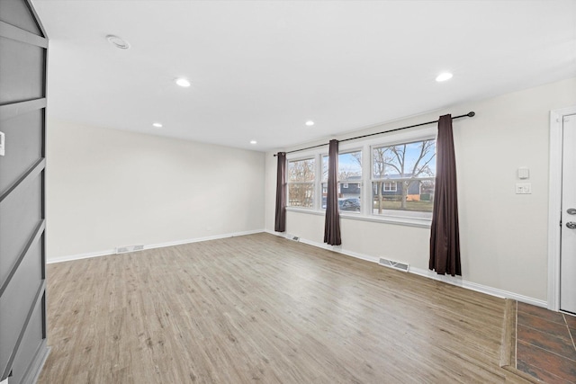 3508 Maple Ln, Hazel Crest, IL 60429 - empty room featuring light wood-style floors and recessed lighting