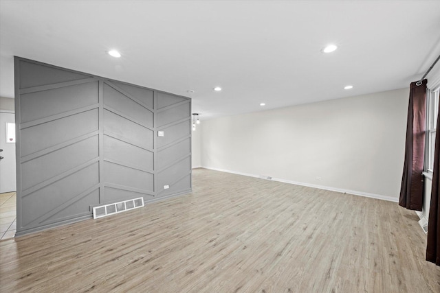 3508 Maple Ln, Hazel Crest, IL 60429 - spare room with wood finished floors and recessed lighting