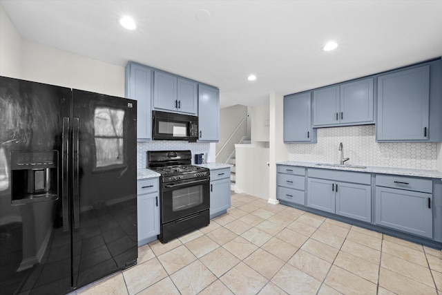 3508 Maple Ln, Hazel Crest, IL 60429 - kitchen with black appliances, tasteful backsplash, light tile patterned floors, light stone countertops, and recessed lighting