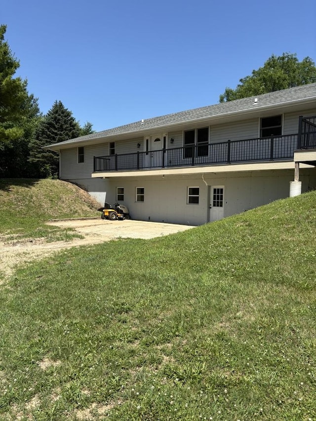 2520 US Route 20th St, Belvidere, IL 61008 - rear view of property with a lawn and a patio area